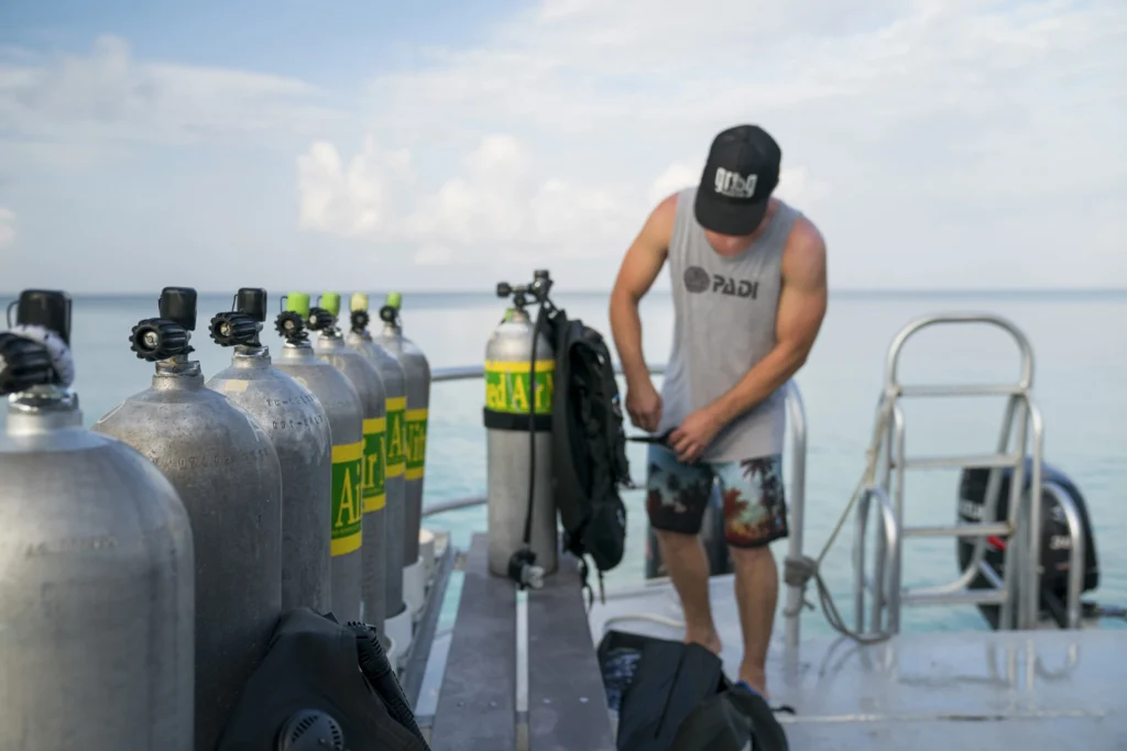 A diver prepares to dive during a PADI Enriched Air Nitrox course.
