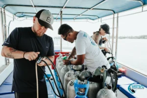 Divers prepare to scuba dive at Menjangan Island with West Bali Diving & Snorkeling PADI dive center in Sumberkima.