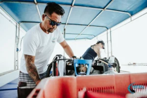 A PADI Instructor prepares equipment for scuba diving Menjangan Island with West Bali Diving & Snorkeling.