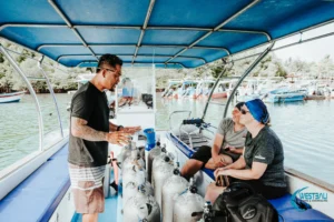 A West Bali Diving & Snorkeling PADI Instructor gives a briefing before diving at Menjangan Island.