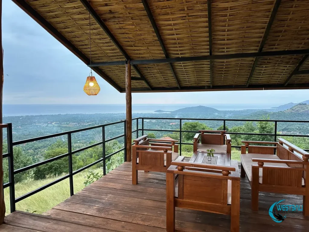 Island and ocean views at D'lingker Cafe on the hillside in Sumberkima.