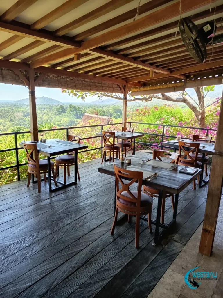 Covered outdoor seating at Suma Restaurant in Sumberkima, Bali.